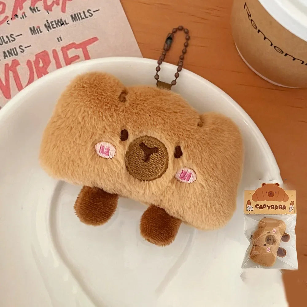 Porte-clé capybara croissant en peluche douce style boulangerie