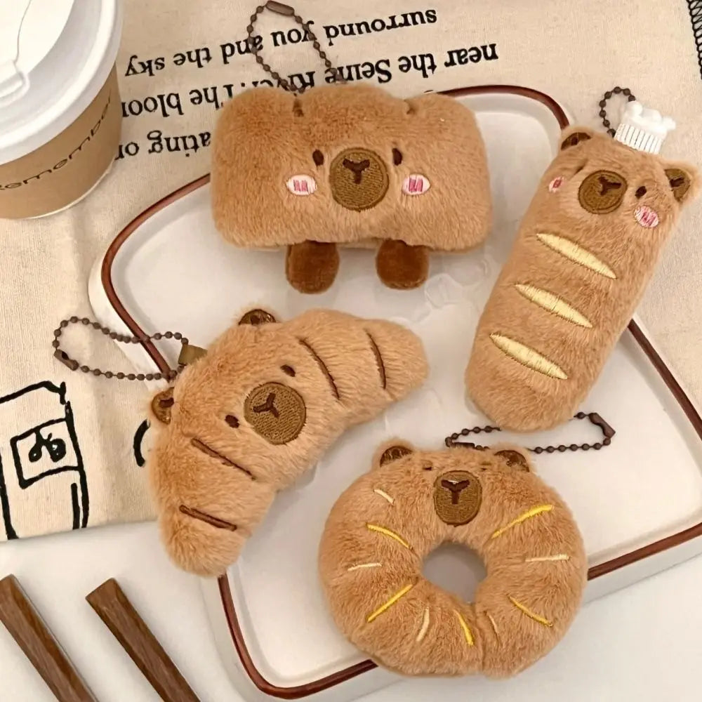 Porte-clé capybara croissant en peluche douce style boulangerie