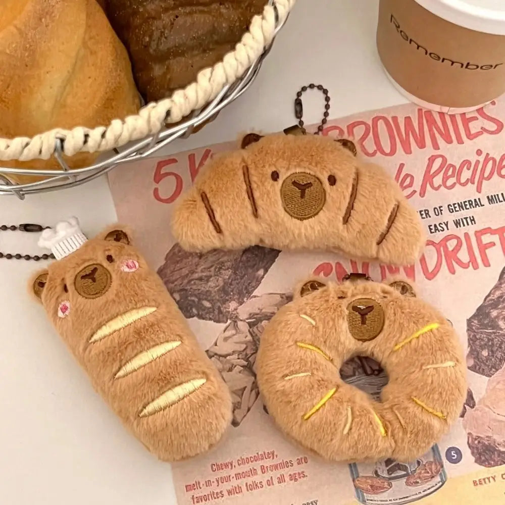 Porte-clé capybara croissant en peluche douce style boulangerie