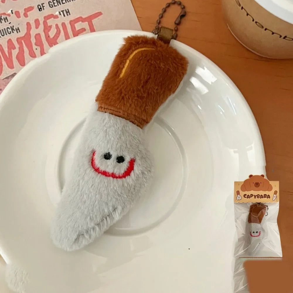 Porte-clé capybara croissant en peluche douce style boulangerie