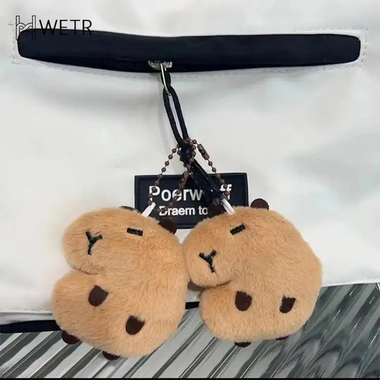 Porte-clé capybara peluche mini avec étoile décorative