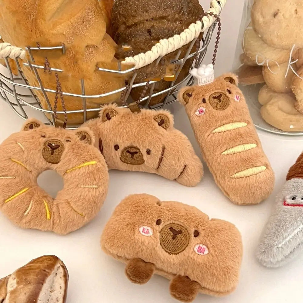 Porte-clé capybara croissant en peluche douce style boulangerie