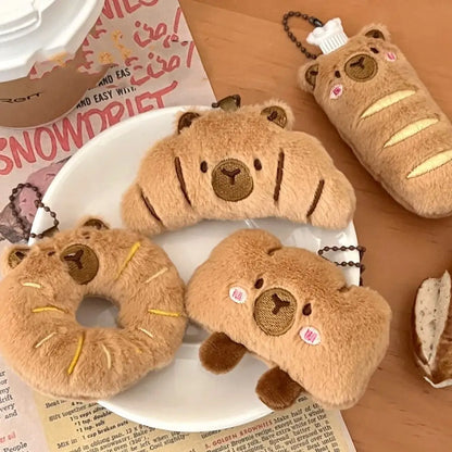 Porte-clé capybara croissant en peluche douce style boulangerie