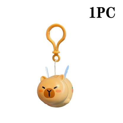 Porte-clé capybara ailé qui tremble en remontant quand on tire le fil