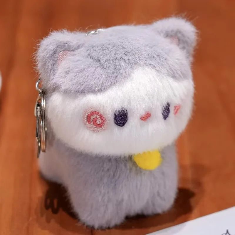 Porte-clé capybara peluche avec une orange sur la tête, à enrouler au poignet