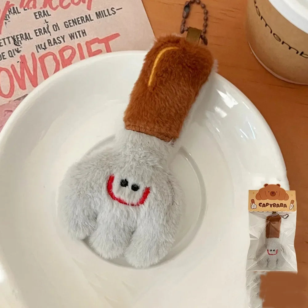 Porte-clé capybara croissant en peluche douce style boulangerie