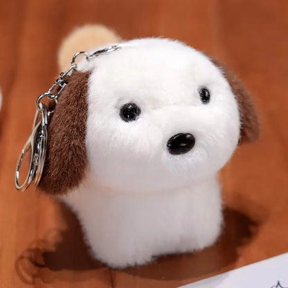 Porte-clé capybara peluche avec une orange sur la tête, à enrouler au poignet
