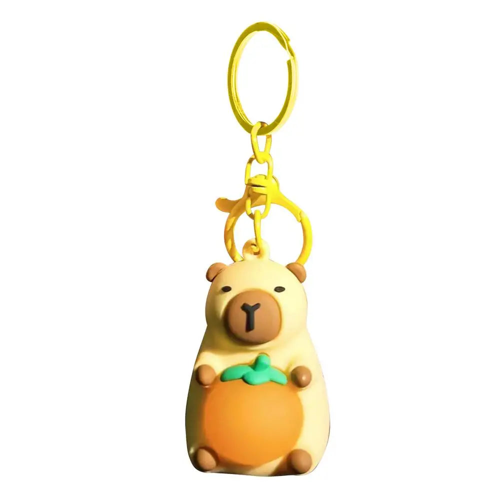 Porte-clé capybara lumineux LED en marron rose ou jaune