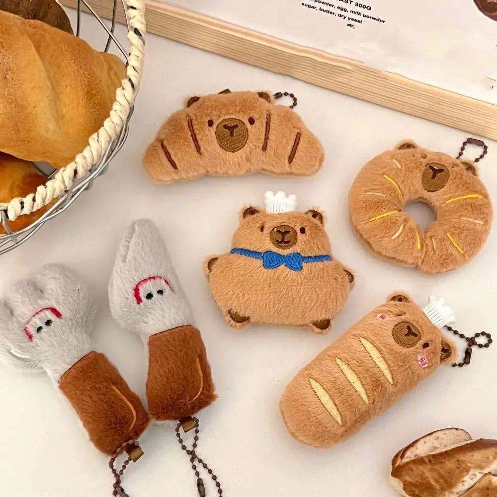 Porte-clé capybara croissant en peluche douce style boulangerie