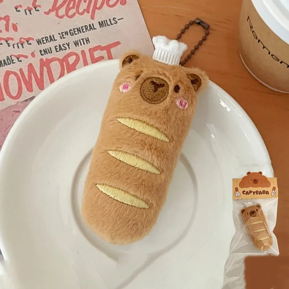 Porte-clé capybara croissant en peluche douce style boulangerie