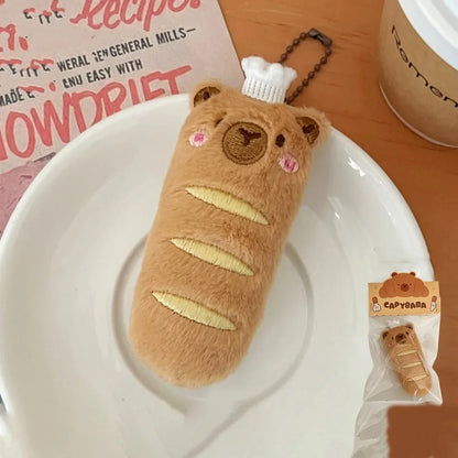 Porte-clé capybara croissant en peluche douce style boulangerie
