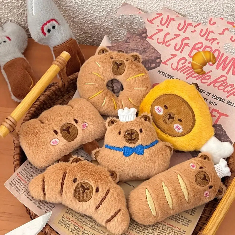 Porte-clé capybara croissant en peluche douce style boulangerie