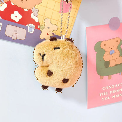 Porte-clé capybara peluche mini avec étoile décorative
