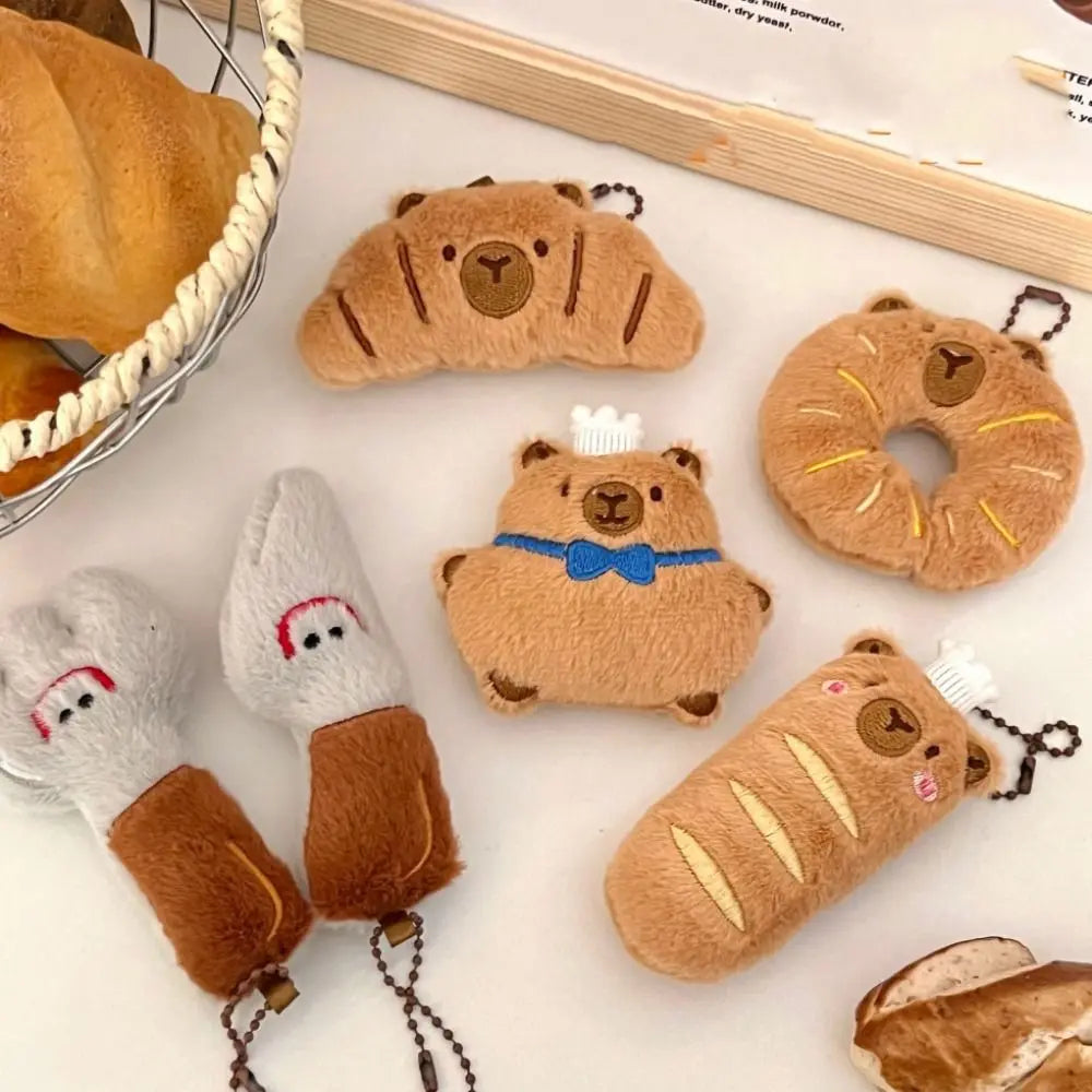 Porte-clé capybara croissant en peluche douce style boulangerie
