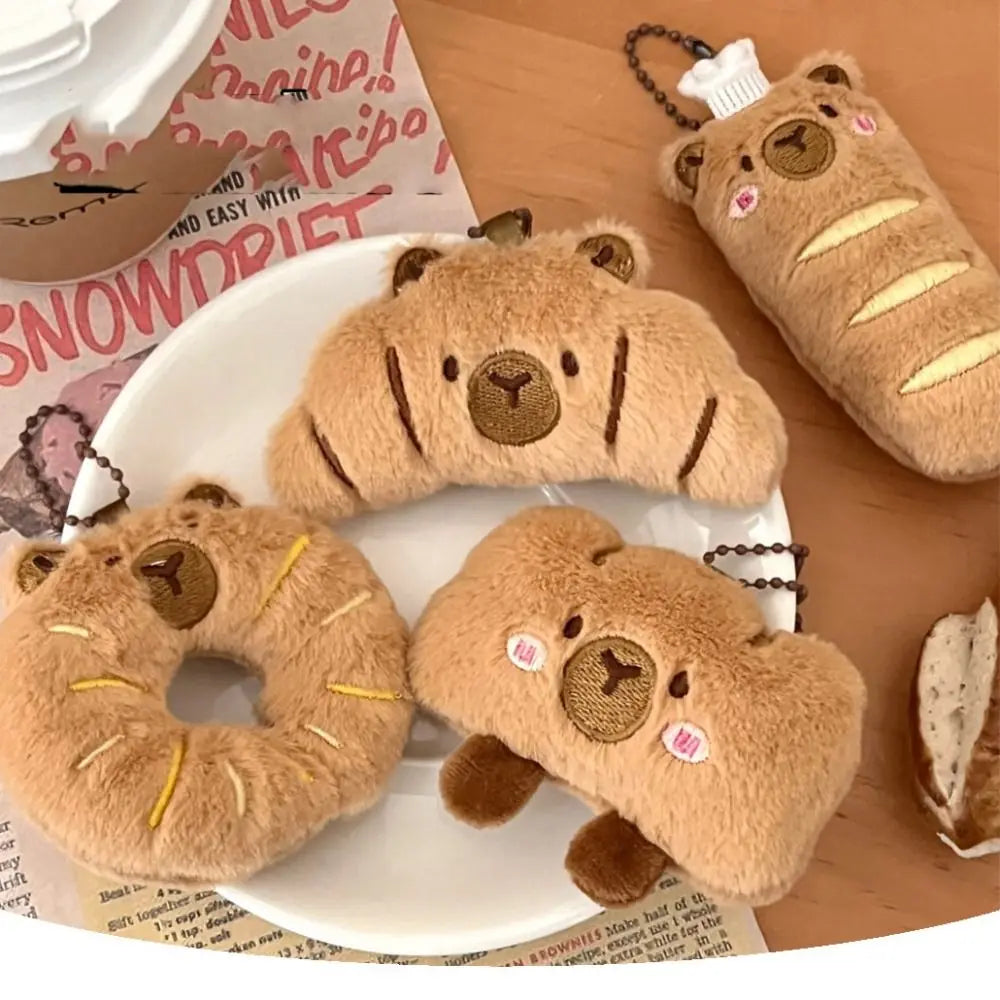 Porte-clé capybara croissant en peluche douce style boulangerie