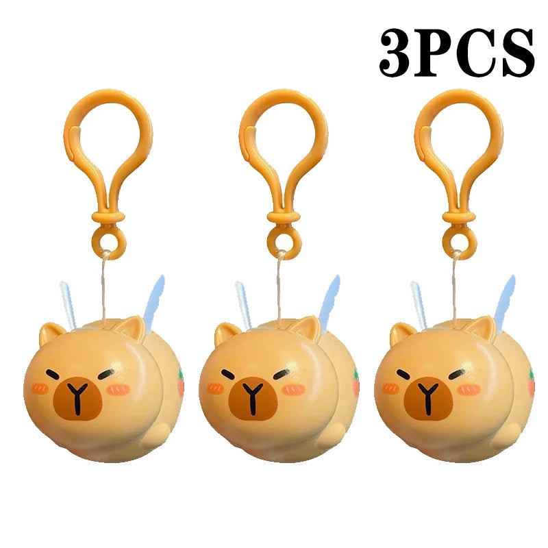 Porte-clé capybara ailé qui tremble en remontant quand on tire le fil