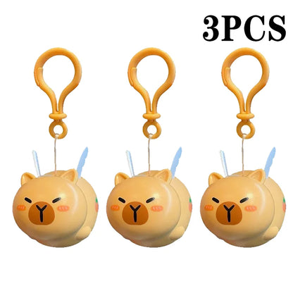 Porte-clé capybara ailé qui tremble en remontant quand on tire le fil